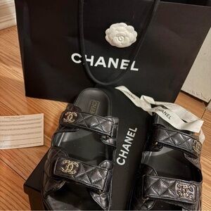 CHANEL Black Quilted Sandals with Gold Details